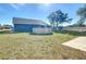 Large backyard with above ground pool, and a view of the house at 14320 Se 96Th Ct, Summerfield, FL 34491