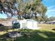 Spacious two car detached garage with fire pit at 14320 Se 96Th Ct, Summerfield, FL 34491