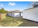 Backyard view of home with shed at 15154 Sw 38Th Cir, Ocala, FL 34473