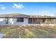 Rear view of house, showcasing the screened porch and backyard at 15154 Sw 38Th Cir, Ocala, FL 34473