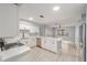 Modern kitchen with white cabinets and quartz countertops at 15154 Sw 38Th Cir, Ocala, FL 34473