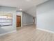 Light and airy living area with wood-look floors and grey walls at 15154 Sw 38Th Cir, Ocala, FL 34473