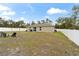 Backyard view of house, showing patio and grill at 16050 Sw 35Th Court Rd, Ocala, FL 34473