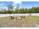 Backyard firepit with seating for relaxing at 16050 Sw 35Th Court Rd, Ocala, FL 34473