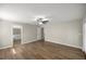 Bright bedroom featuring wood-look floors and a ceiling fan at 16689 Sw 22Nd Terrace Rd, Ocala, FL 34473