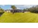 Expansive backyard with a screened-in pool and plenty of lawn space at 17920 Sw 66Th Pl, Dunnellon, FL 34432