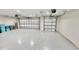 Large two-car garage with epoxy floor at 17920 Sw 66Th Pl, Dunnellon, FL 34432