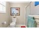 Clean bathroom with toilet and shower at 1918 Walden Way, The Villages, FL 32162