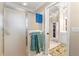 Bathroom with shower and access to another bathroom at 1918 Walden Way, The Villages, FL 32162