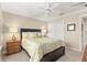 Bright bedroom with double closets and ceiling fan at 1918 Walden Way, The Villages, FL 32162