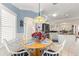 Charming breakfast nook with round table and white chairs at 1918 Walden Way, The Villages, FL 32162