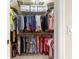 Spacious closet with double hanging rods and shelving at 1918 Walden Way, The Villages, FL 32162