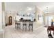 Kitchen with breakfast bar and stylish pendant lights at 1918 Walden Way, The Villages, FL 32162