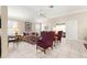 Bright living room with plantation shutters and tile floors at 1918 Walden Way, The Villages, FL 32162