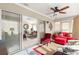 Sunroom with sliding doors leading to living room at 1918 Walden Way, The Villages, FL 32162