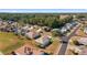 Aerial view of a residential community showcasing well-maintained homes and landscaping at 2111 Nw 58Th Ct, Ocala, FL 34482