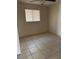 Spacious bedroom with tile floors and a ceiling fan at 2317 Ne 37Th St, Ocala, FL 34479