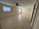 Large living room with tile floors and lots of natural light at 2317 Ne 37Th St, Ocala, FL 34479