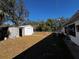 Large backyard with detached shed and trees at 2849 Sw 140 Pl, Ocala, FL 34473