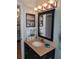 Bathroom with a vanity, shelves, and tiled floor at 2969 Sw 142Nd Ln, Ocala, FL 34473