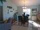 Charming dining area with glass table and four chairs at 2969 Sw 142Nd Ln, Ocala, FL 34473