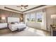 Spacious bedroom with large windows and stylish decor at 3091 Canopy Oak Blvd, Wildwood, FL 34785