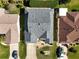 Top-down view of a house nestled in a neighborhood at 3165 Hudson Ct, The Villages, FL 32162