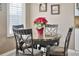 Cozy breakfast nook with a round table and four chairs, perfect for small meals at 3165 Hudson Ct, The Villages, FL 32162