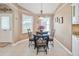 Cozy breakfast nook with a round table and chairs, near the kitchen at 3165 Hudson Ct, The Villages, FL 32162