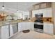 Modern kitchen featuring stainless steel appliances and granite countertops at 3165 Hudson Ct, The Villages, FL 32162