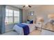 Bedroom with water view and blue and white bedding at 342 Hickory Course Trl, Ocala, FL 34472