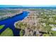 Aerial view of riverfront property with homes in the distance at 4925 Cr 309B, Lake Panasoffkee, FL 33538