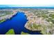 Aerial view showcasing the waterfront property and neighborhood at 4925 Cr 309B, Lake Panasoffkee, FL 33538