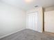 Bedroom with double door closet and access to another room at 5 Walnut Ct, Ocala, FL 34480