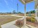 Front yard with landscaping and concrete walkway at 5 Walnut Ct, Ocala, FL 34480