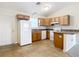 Efficient kitchen with ample cabinetry and appliances at 5 Walnut Ct, Ocala, FL 34480