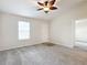 Spacious living room with entryway and view to bedroom at 5 Walnut Ct, Ocala, FL 34480