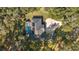 Aerial view showing house, pool, and surrounding landscape at 5224 Se 44Th Cir, Ocala, FL 34480