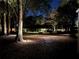 Backyard at night with landscape lighting at 5224 Se 44Th Cir, Ocala, FL 34480