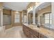 Elegant bathroom with double vanity and granite countertop at 5224 Se 44Th Cir, Ocala, FL 34480