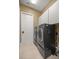 Laundry room with washer, dryer, and built-in cabinets at 5224 Se 44Th Cir, Ocala, FL 34480