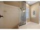 Large walk-in shower with glass enclosure and tile surround at 5224 Se 44Th Cir, Ocala, FL 34480