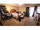 Large bedroom with a queen-size bed and plenty of space for additional furniture at 5491 Sw 100Th Loop, Ocala, FL 34476