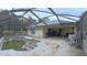 Large inground pool with a screened enclosure at 5491 Sw 100Th Loop, Ocala, FL 34476