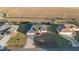 Aerial view of single-story house with pool and fenced backyard at 5525 Sw 80Th Pl, Ocala, FL 34476