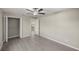 Spacious bedroom with ample closet space and wood-look floors at 5525 Sw 80Th Pl, Ocala, FL 34476