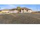 House exterior showcasing a palm tree and driveway at 5525 Sw 80Th Pl, Ocala, FL 34476