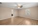 Bright bedroom with laminate flooring and ceiling fan at 562 Silver Course Loop, Ocala, FL 34472