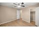 Bedroom with ceiling fan and access to closet at 562 Silver Course Loop, Ocala, FL 34472