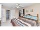 King-size bedroom with en-suite bathroom access at 8137 Sw 117Th Loop, Ocala, FL 34481